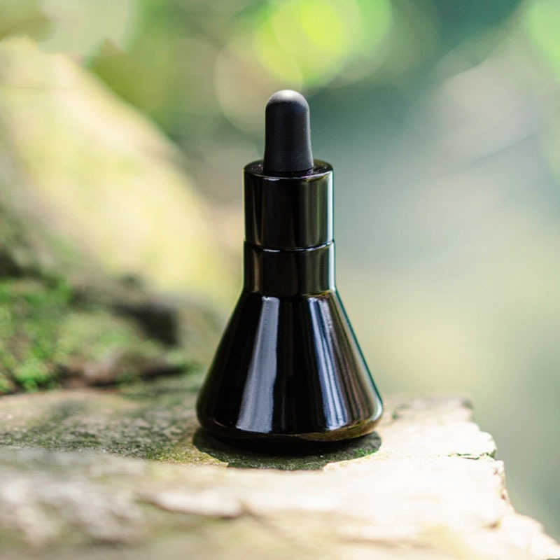 Embalagem cosmética de vidro cônico preto para garrafa de óleo essencial Embalagem cosmética de vidro cônico preto para garrafa de óleo essencial
