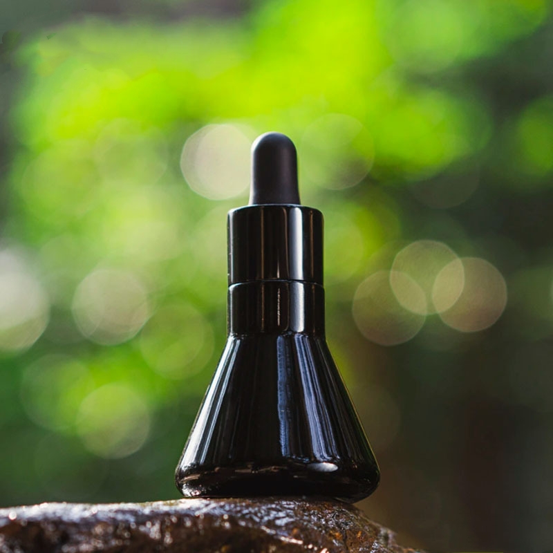 Embalagem cosmética de vidro cônico preto para garrafa de óleo essencial Embalagem cosmética de vidro cônico preto para garrafa de óleo essencial