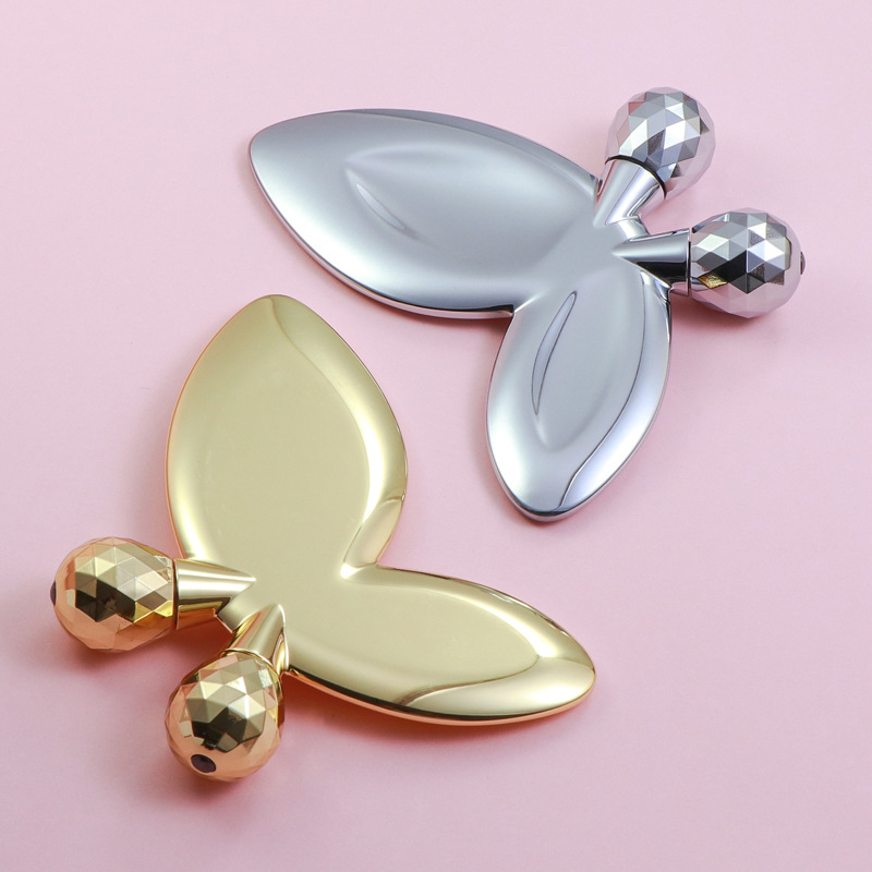 Rolo de massagem facial em forma de borboleta de liga de zinco