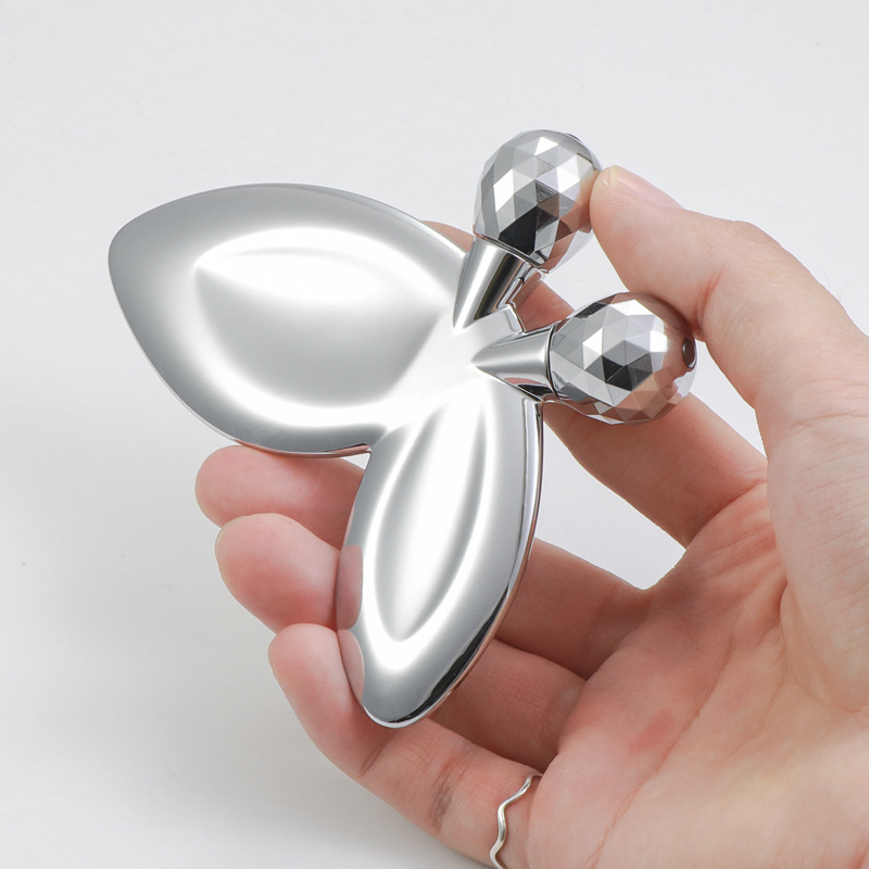 Rolo de massagem facial em forma de borboleta de liga de zinco Rolo de massagem facial em forma de borboleta de liga de zinco