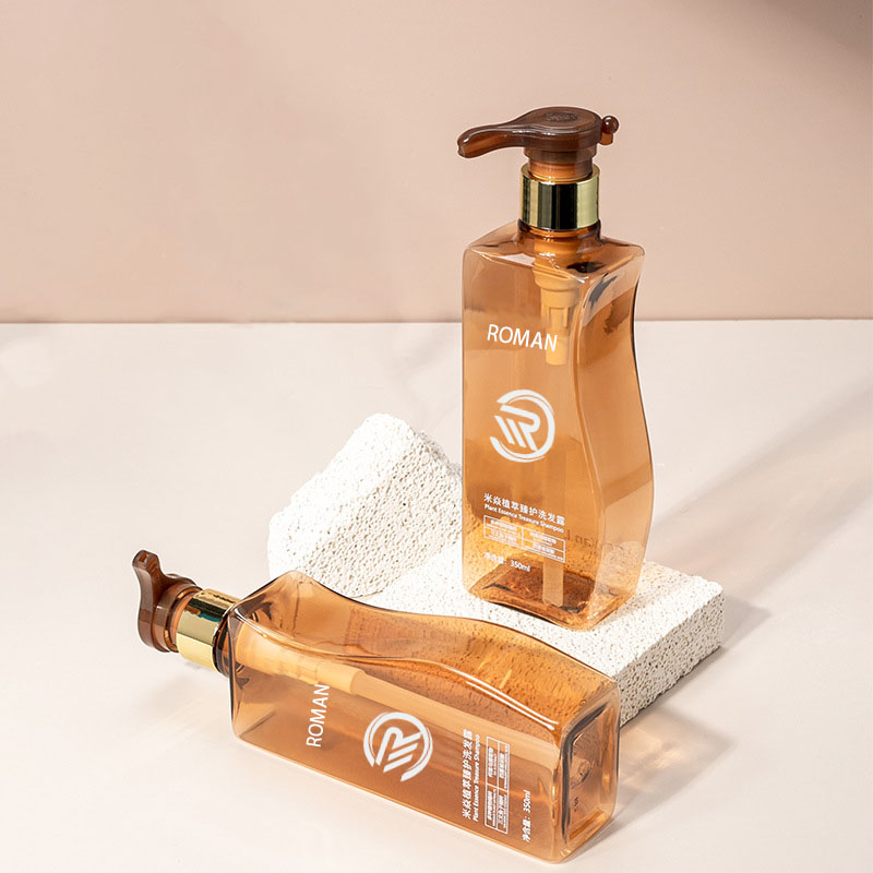 Frasco de loção corporal vazio de plástico âmbar em forma de curva confiável de 350ml 500ml com bomba para cuidados com os cabelos, shampoo, condicionador ou creme facial Frasco de loção corporal vazio de plástico âmbar em forma de curva confiável de 350ml 500ml com bomba para cuidados com os cabelos, shampoo, condicionador ou creme facial