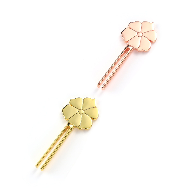 Espremedor de tubos de liga de zinco em forma de flor sorridente Espremedor de tubos de liga de zinco em forma de flor sorridente