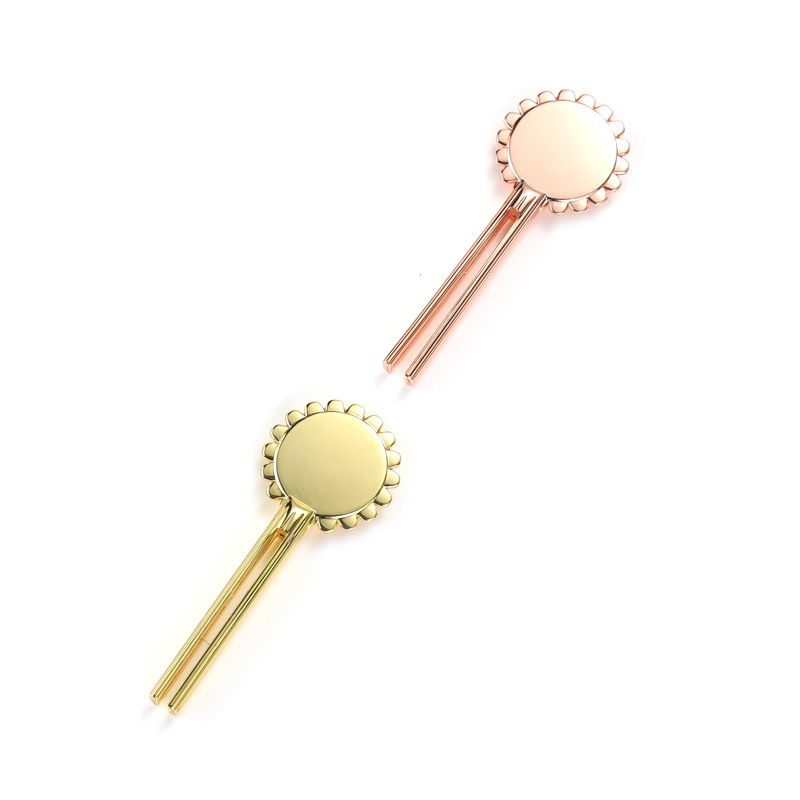 Espremedor de tubos de liga de zinco em forma de flor sorridente Espremedor de tubos de liga de zinco em forma de flor sorridente