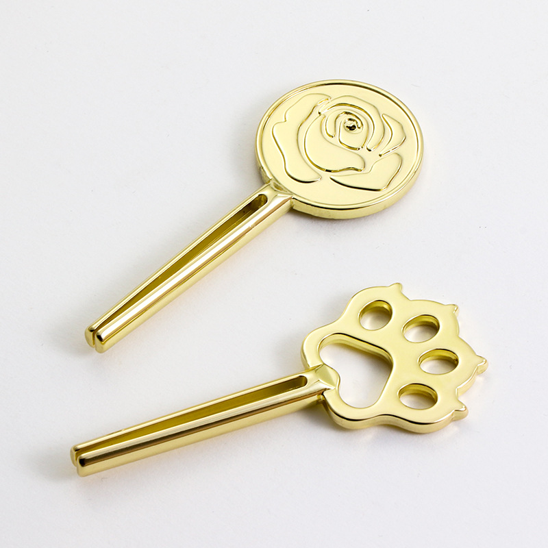 Design exclusivo de espremedor de tubo de liga de zinco em forma de pata de gato para comida de gato Design exclusivo de espremedor de tubo de liga de zinco em forma de pata de gato para comida de gato